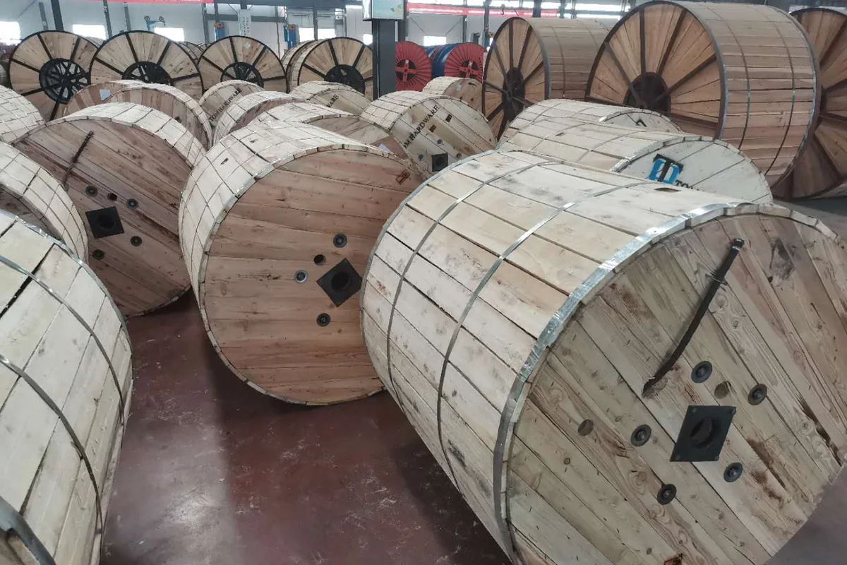 Overhead conductors packed on wooden drums for shipment